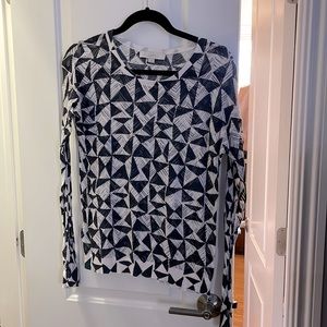 Lightweight sweater with geometric pattern.